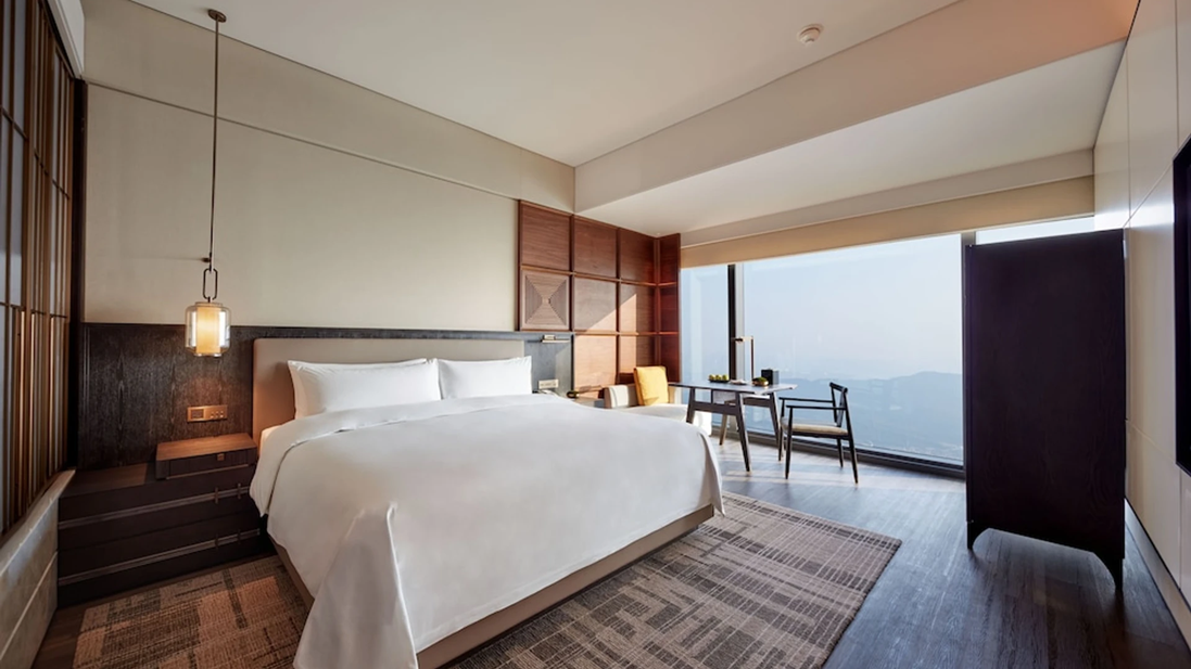 Spacious room with mountain views and desk